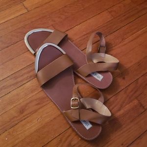 Brown leather sandals with golden tip